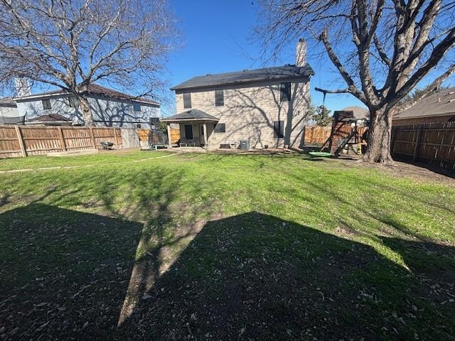 view of yard with a playground