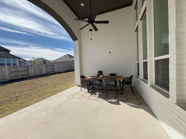 view of patio featuring ceiling fan