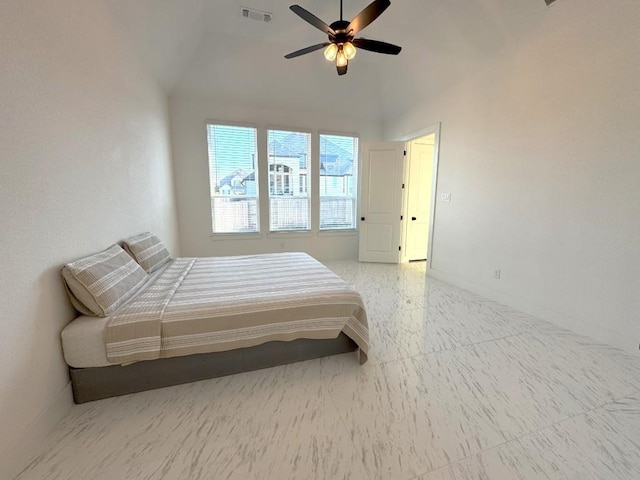 bedroom with ceiling fan and lofted ceiling