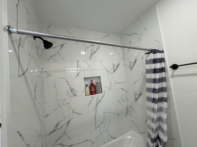 bathroom featuring shower / tub combo with curtain