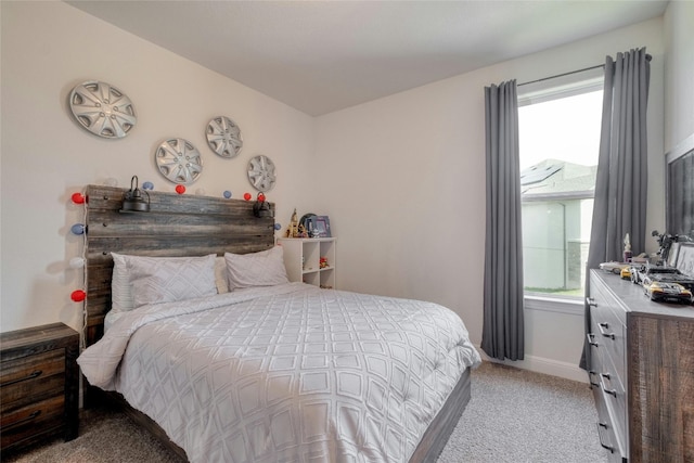 bedroom with light colored carpet