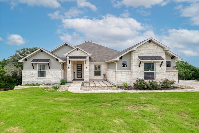 craftsman inspired home with a front lawn