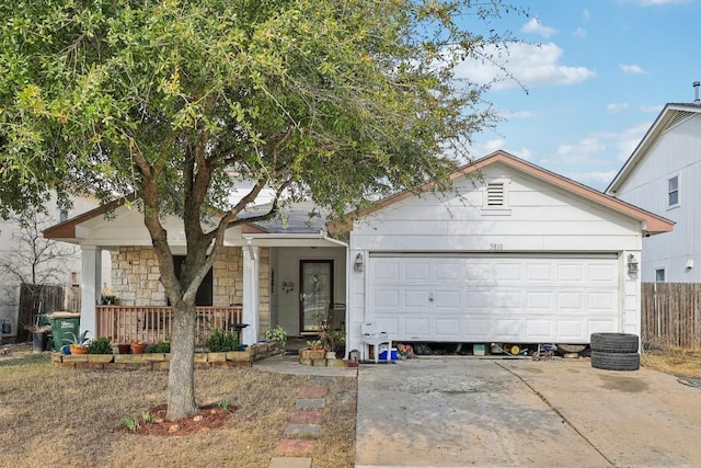 single story home with a garage and a porch