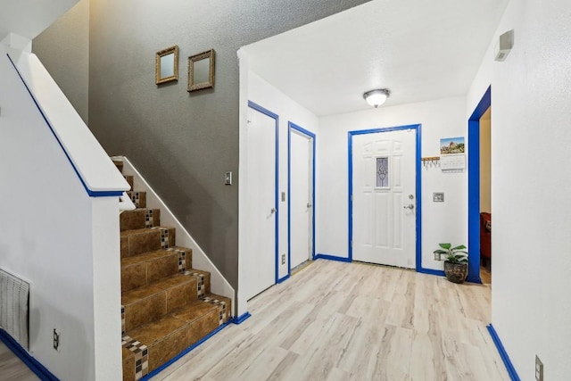 entrance foyer featuring light hardwood / wood-style flooring