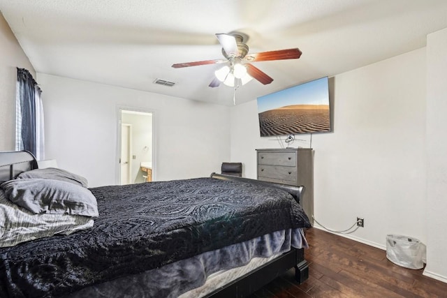 bedroom with ceiling fan and dark hardwood / wood-style flooring