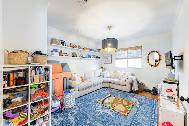 rec room featuring hardwood / wood-style flooring and ornamental molding