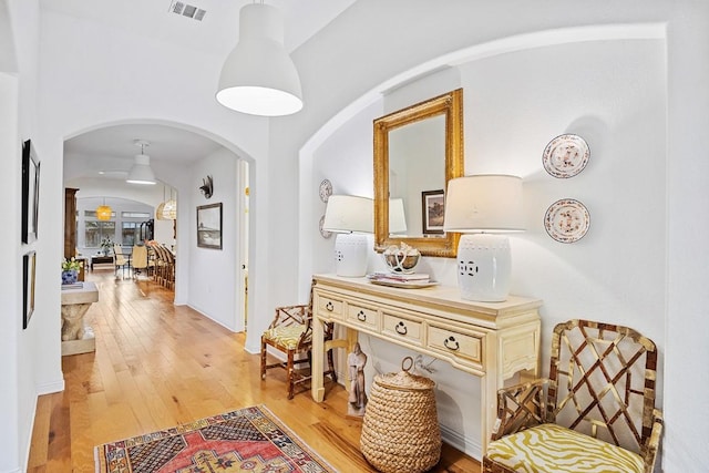 hallway featuring light hardwood / wood-style flooring