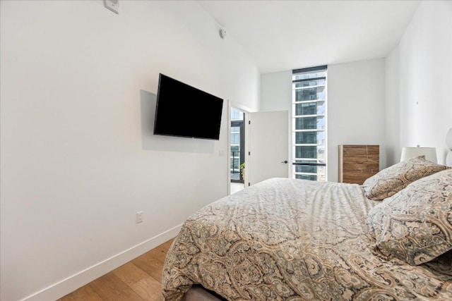 bedroom with light wood-type flooring