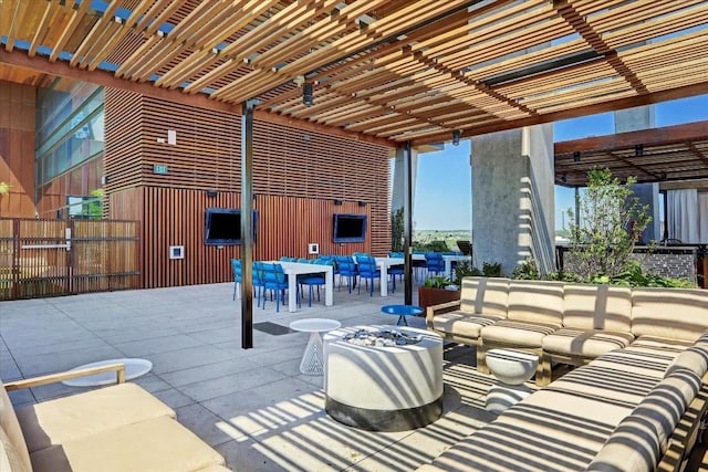 view of patio / terrace featuring outdoor lounge area and a pergola