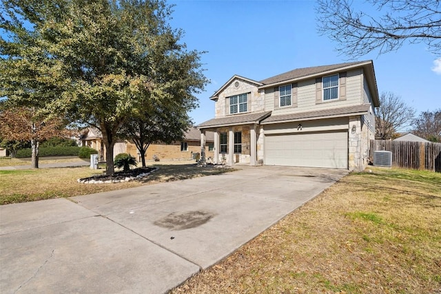 view of front facade featuring a garage, central air condition unit, and a front lawn