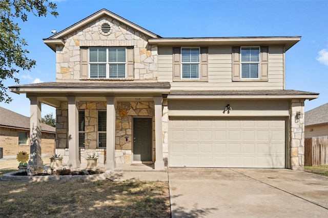 view of front of home featuring a garage and covered porch