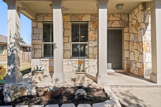 entrance to property with a porch