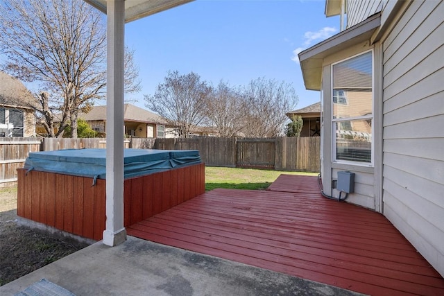 deck featuring a hot tub