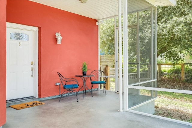 sunroom featuring plenty of natural light