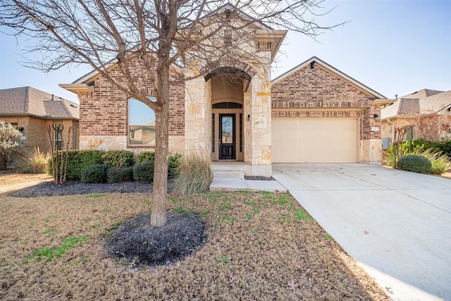 view of front of home with a garage