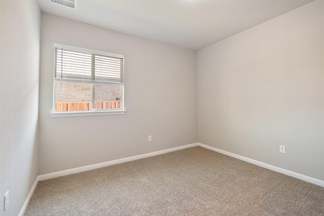 spare room with carpet flooring