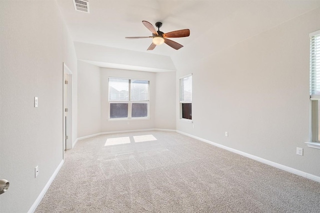 carpeted empty room featuring ceiling fan