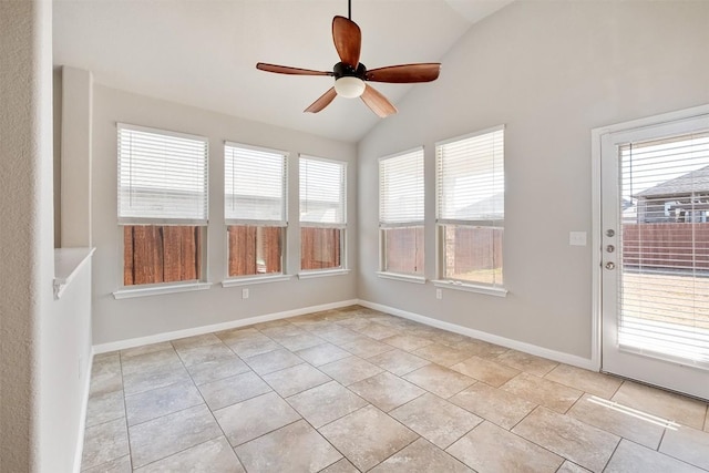 unfurnished sunroom featuring lofted ceiling and ceiling fan