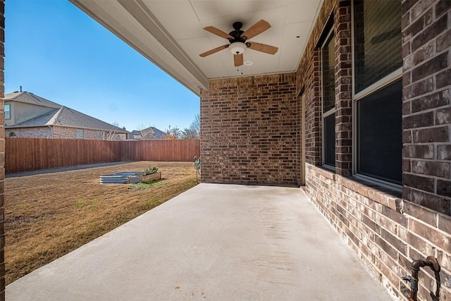 view of patio / terrace featuring ceiling fan