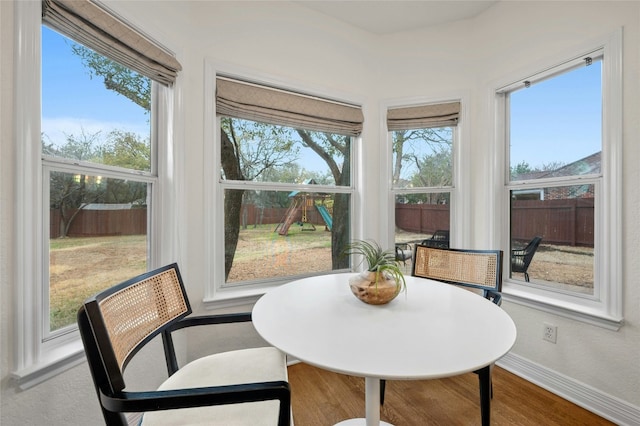 sunroom / solarium featuring a wealth of natural light