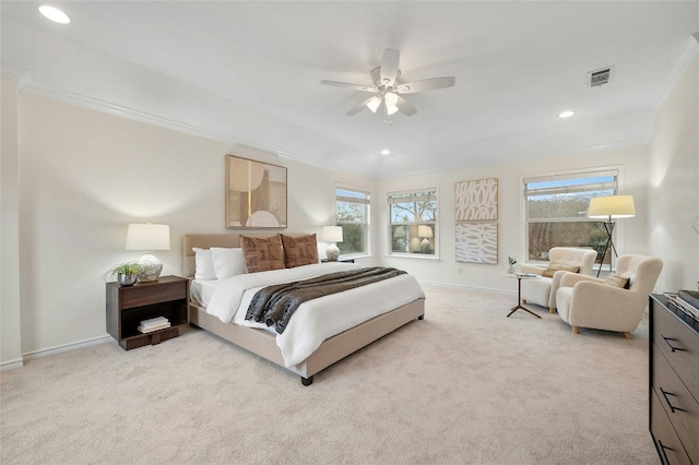 carpeted bedroom featuring ceiling fan, ornamental molding, and multiple windows