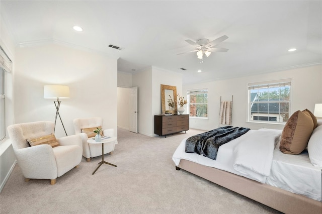 bedroom with crown molding, light colored carpet, and ceiling fan