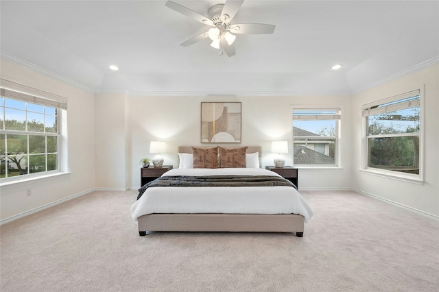 carpeted bedroom featuring multiple windows, ornamental molding, and ceiling fan