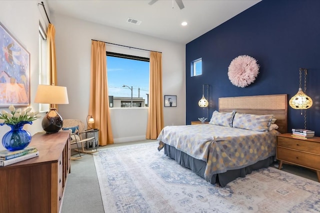 carpeted bedroom featuring ceiling fan