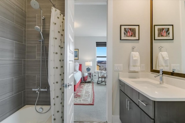 bathroom featuring vanity and shower / bath combination with curtain