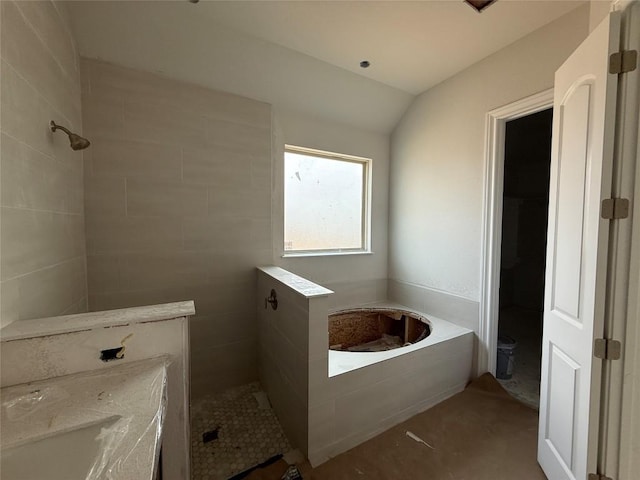 bathroom with plus walk in shower and lofted ceiling