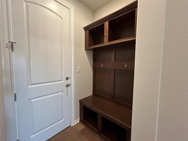 mudroom with dark wood-type flooring