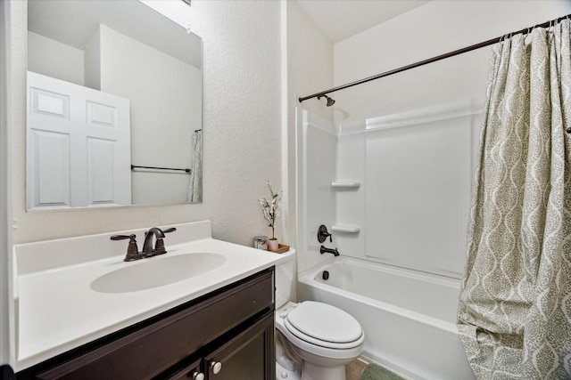 full bathroom featuring vanity, shower / tub combo, and toilet