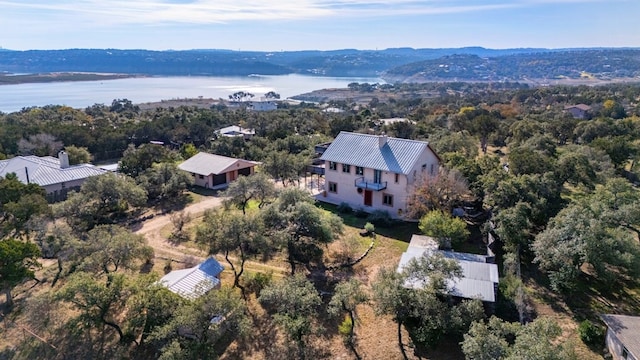 bird's eye view featuring a water and mountain view