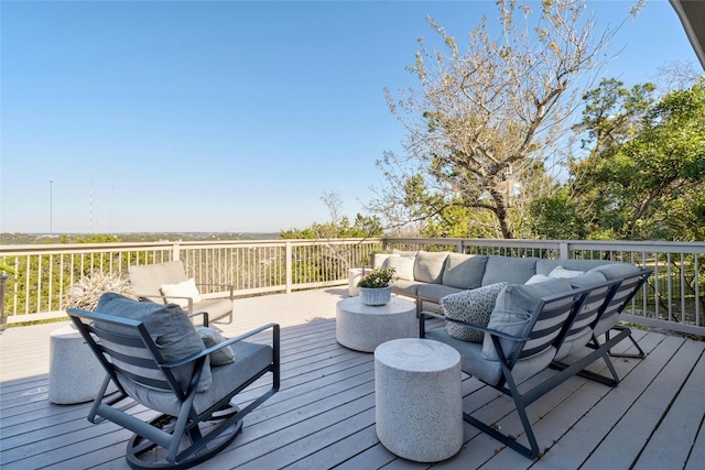 wooden deck featuring an outdoor living space