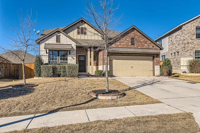 view of front of home with brick siding, an attached garage, board and batten siding, fence, and driveway