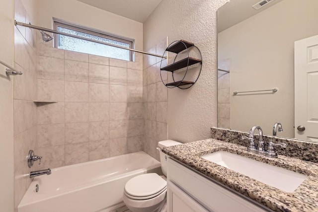 3264 Pablo Cir, Round Rock, TX 78665 - bathroom with vanity, a textured wall, and shower / washtub combination
