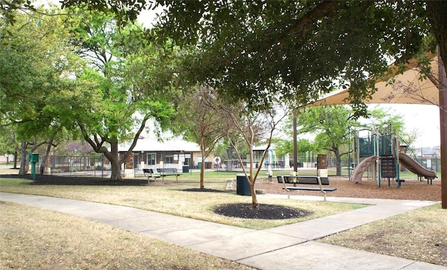 view of home's community featuring a playground