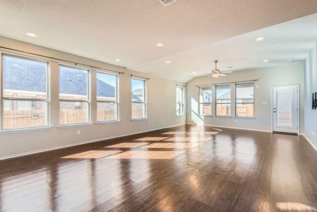 3264 Pablo Cir, Round Rock, TX 78665 - empty room with dark wood finished floors, a ceiling fan, a textured ceiling, and recessed lighting