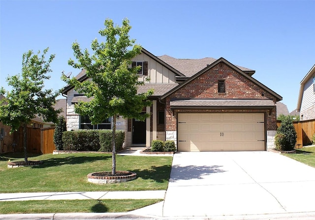 3264 Pablo Cir, Round Rock, TX 78665 - view of front of home featuring driveway, board and batten siding, brick siding, roof with shingles, and a garage