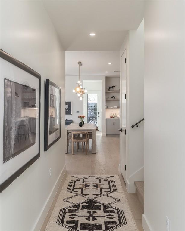 1702 Bauerle Ave, Austin, TX 78704 - hall with a chandelier and recessed lighting