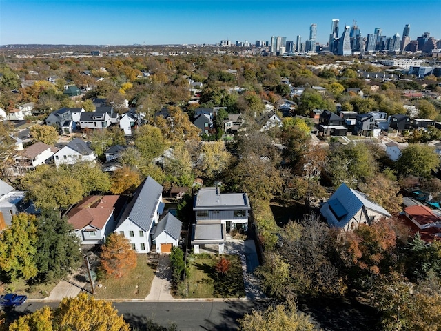 1702 Bauerle Ave, Austin, TX 78704 - aerial view of property and surrounding area featuring nearby suburban area and skyline