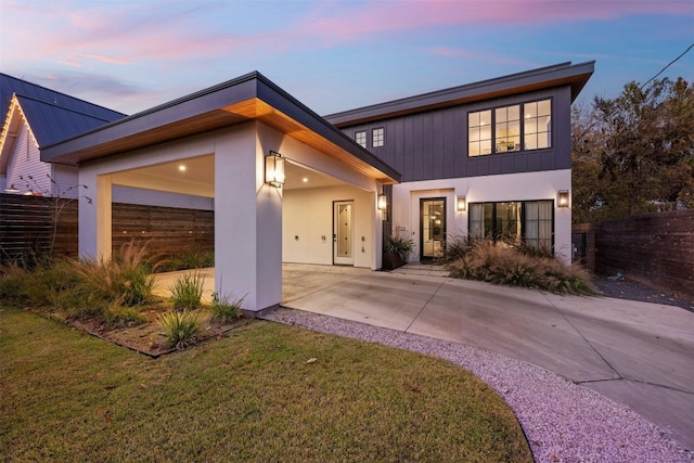 1702 Bauerle Ave, Austin, TX 78704 - view of front of house featuring driveway and stucco siding