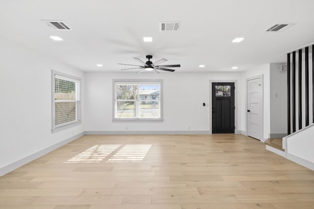 interior space featuring ceiling fan and light hardwood / wood-style flooring