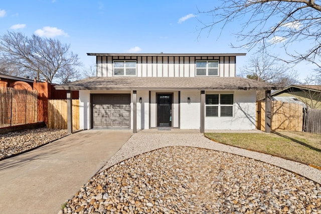 view of front of property with a garage