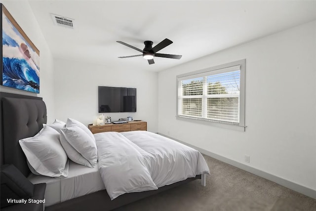 carpeted bedroom featuring ceiling fan