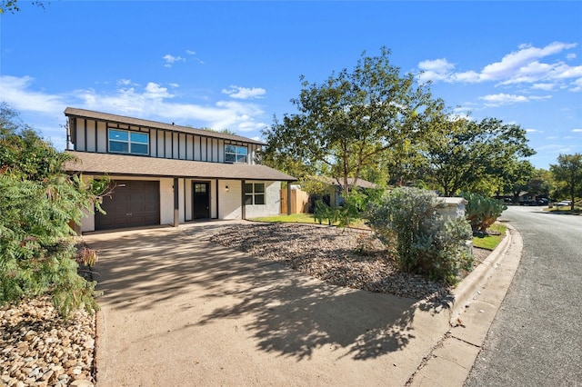 view of front of property with a garage