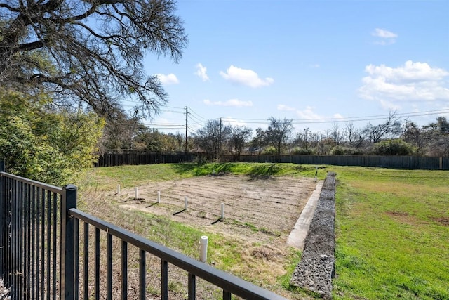 view of yard featuring fence