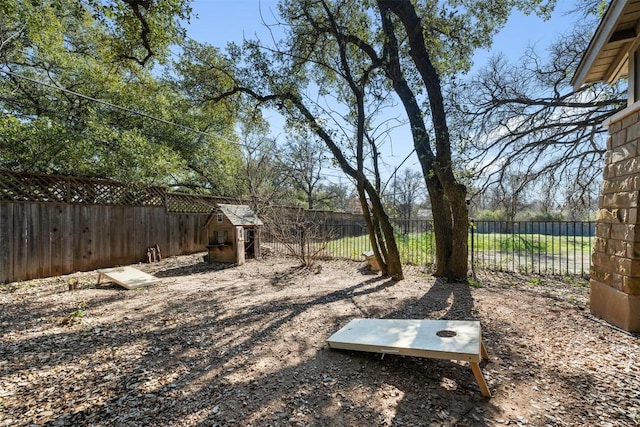 view of yard with a fenced backyard