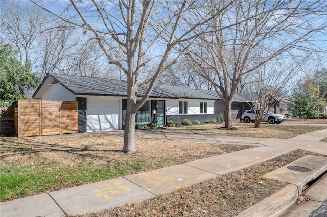 ranch-style house with a garage