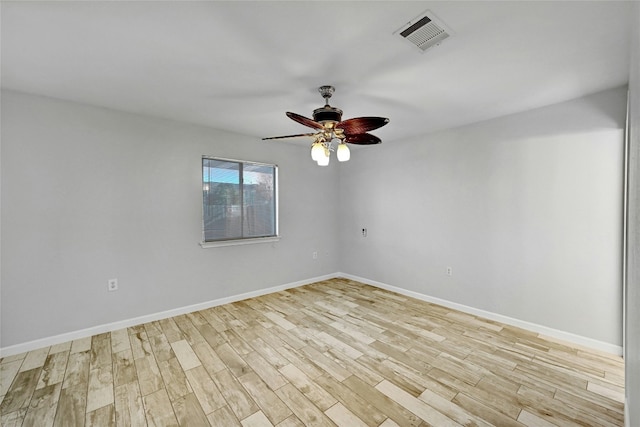 unfurnished room featuring ceiling fan and light wood-type flooring